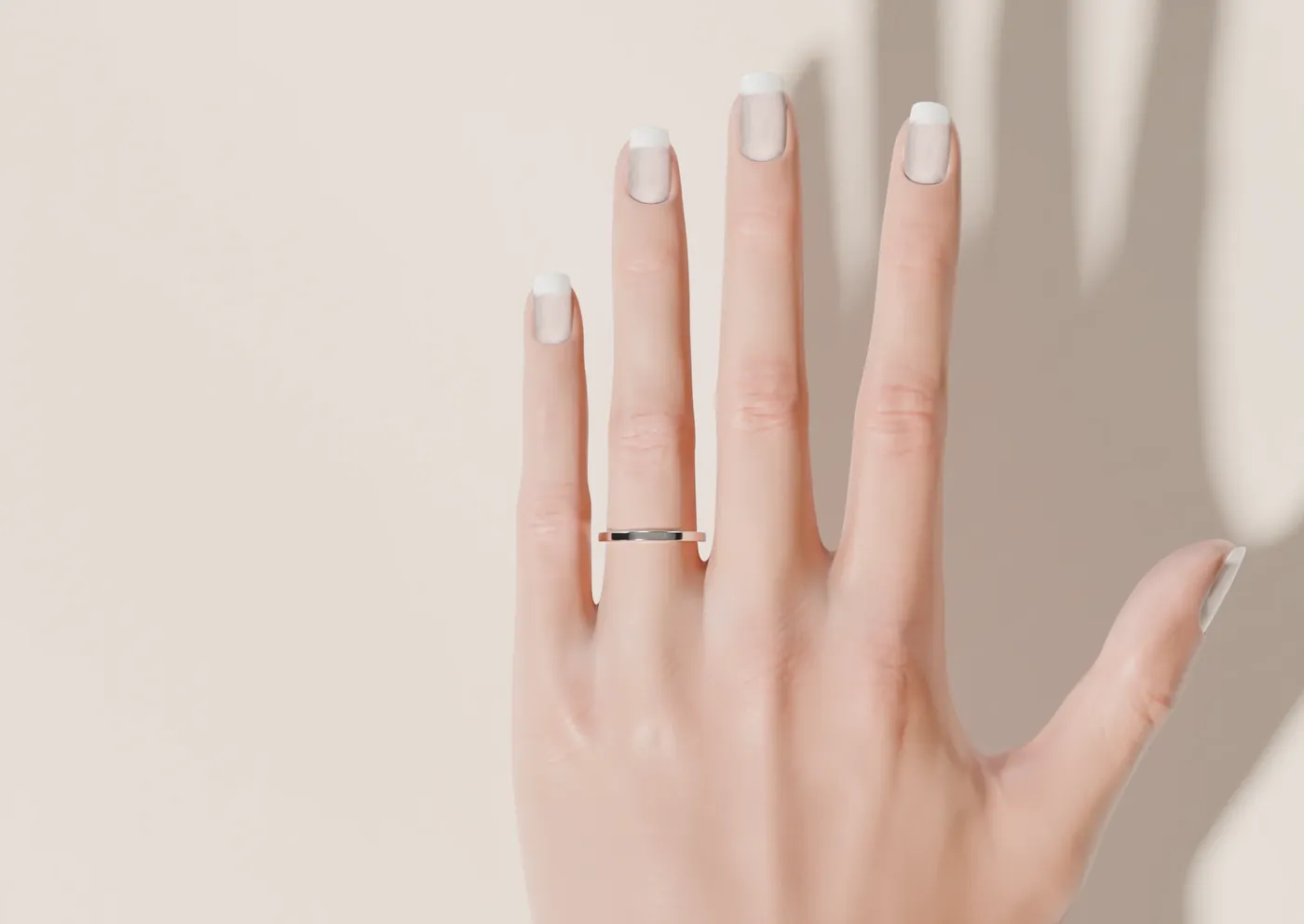 A hand with a slim band, the plate used for true-size try-on